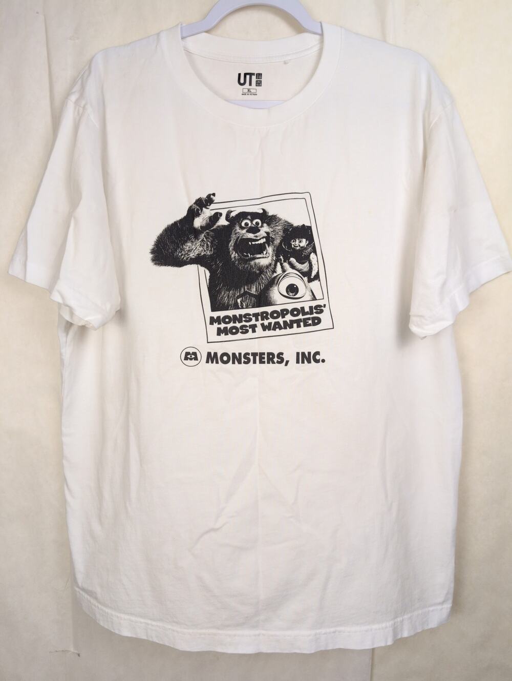 Uniqlo UT Pixar Monsters Inc tshirt size XL White Monstropolis graphic Y2K